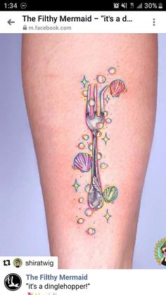 a woman's leg with a fork and spoon tattoo on it