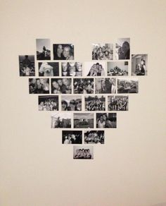 a heart shaped photo hanging on the wall