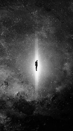 a person standing in the middle of a space filled with stars