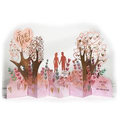 three pop up cards with trees and hearts in the shape of two people standing next to each other