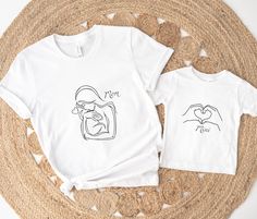 Mommy and Me Matching Outftis with a Mother holding her Child in her Arms and two Hands shaped into a Heart, Family Outfits, Matching Sets Mommy And Mini, Outfits Matching, Hand Shapes, Family Outfits, Text Design