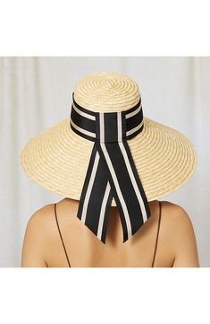 A striped ribbon puts a sophisticated spin on this charming sun hat shaped from cool, lightweight straw that offers UPF sun protection. UPF 50+ sun protection Straw/textile Spot clean Imported Chic Straw Hat For Picnic, Striped Brimmed Sun Hat For Beach, Striped Brimmed Sun Hat For The Beach, Striped Wide Brim Sun Hat For Vacation, Striped Brimmed Straw Hat For Vacation, Striped Brimmed Straw Hat For Summer, Summer Striped Brimmed Straw Hat, Striped Straw Hat For Summer Vacation, Summer Beach Hat With Stripes