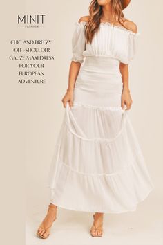 Make a statement in our Only Sunny Days Ahead Off-Shoulder Gauze Maxi Dress during your European adventure! This chic white maxi dress features a flattering off-shoulder neckline and airy gauze fabric, perfect for exploring charming European towns or attending sunset dinners by the sea. Elevate your vacation wardrobe with this stylish ensemble. #EuropeanAdventure #OffShoulderMaxi #ChicSummerDress #SunnyDaysAhead Gauze Maxi Dress, Chic Summer Dresses, White Maxi Dress, White Maxi, White Maxi Dresses, By The Sea