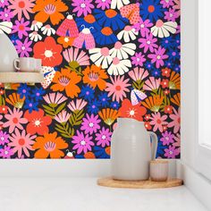 an image of a colorful wallpaper with flowers and birds on the wall behind it