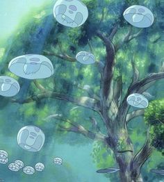 a tree filled with lots of bubbles floating in the air