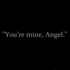 the words you're mine, angel are written in black on a dark background