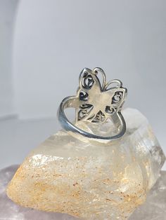 "Butterfly Ring Butterflies Band sterling silver women Size 6.75 Weight 5.4g Length. 7/8\" Width. 1/2\" Thinnest part of band 1/8\" Free Shipping & Free Postal Insurance Delivered in a Gift Box If you do not want the ring polished and want to leave the natural patina please let me know at the time of purchase as I do polish rings before I ship rings out. Thanks Free First Class shipping and postal insurance is included. If you want to upgrade to priority kindly pay an additional fee to do so Nickel-free Sterling Silver Butterfly Ring Gift, Adjustable Sterling Silver Butterfly Ring, Adjustable Sterling Silver Butterfly Ring For Weddings, Sterling Silver Hallmarked Butterfly Ring For Wedding, Sterling Silver Hallmarked Butterfly Wedding Ring, Adjustable Nickel-free Butterfly Ring, Silver Nickel-free Rings, Silver Engraved Butterfly Jewelry, Butterfly Shaped Sterling Silver Promise Ring