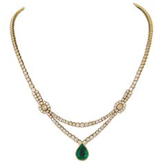 Indulge in timeless elegance with our exquisite Important Emerald and Diamond Necklace crafted in luxurious 18k Yellow Gold. This stunning piece features a majestic Pear Shape Emerald, boasting a weight of approximately 6.00 carats. Renowned for its fine color and impeccable clarity, this emerald captivates with its brilliance, with no imperfections visible to the naked eye. Accentuating the allure of the emerald are two resplendent Oval Cut Diamonds, weighing approximately 0.70 carats in total. Luxury Oval Necklace With Stones, Luxury Yellow Gold Emerald Necklace Pear-shaped, 1stdibs Jewelry, Emerald And Diamond Necklace, Aesthetic Jewellery, Drop Necklaces, South Sea Pearl Necklace, Noble Lady, The Bling Ring