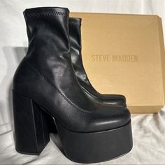 Brand: Steve Madden Style: Emerald High Heel Boots Woman’s Sizes Available Colorway: Matte Black Condition: New With Box Always Giving The Best Prices! Get Them While In Stock! These Shoes Are Hot & In Demand! Make Sure To Hit The Like Button For Special Discounts And Offers! I Am Always Posting New Listings Everyday! My Page Also Lists A Variety Of Shoes, Clothes And Accessories! If You Have Any Questions Feel Free To Message Me. I Am A Reliable Seller And All Items Are Alway 100% Authentic. I Chunky Platform Heels In Faux Leather For Fall, Trendy Leather Platform Boots For Night Out, Polyurethane Heels For Night Out In Fall, Medium Width Polyurethane Platform Boots For Party, Faux Leather Platform Boots With Stacked Heel, Fall Platform Heels In Faux Leather, Fall Faux Leather Platform Heels, Square Toe Faux Leather Platform Boots For Night Out, Chunky Platform Faux Leather Heeled Boots For Night Out