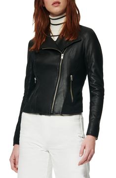 A cleanly styled leather jacket is a wear-anywhere piece. Moto-inspired design lends subtle edge, while knit side and sleeve panels bring enhanced fit and mobility.Runs small; order one size up.
XS=0-2, S=4-6, M=8-10, L=12-14, XL=16. 21" length (size Medium). Asymmetrical front-zip closure. Front zip pockets. Lined. Leather with 100% acrylic trim. Professional leather clean. Imported. Coats Long Sleeve Leather Jacket For Layering, Sleek Fitted Leather Jacket For Fall, Modern Fitted Outerwear With Zipper Closure, Modern Fitted Biker Jacket For Fall, Fitted Leather Jacket For Layering, Winter Workwear Leather Jacket With Asymmetrical Zip, Winter Leather Jacket With Asymmetrical Zip For Work, Asymmetrical Zip Leather Jacket For Work In Winter, Fitted Leather Outerwear For Layering