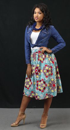 "Kimberley is in our line of colorful but elegant african cotton print midi skirts. Pair this teal blue print with a tank for a casual look or with an elegant blouse for a more formal look. Of course, accessories! Length: 28\" 2 concealed pockets Model wears Medium Ships from the USA within 1 to 2 business days Shop the Pre Black Friday sale at the most stylish African Print store online! *Sale items are final sale." Blue Cotton Printed Skirt, Blue Printed Cotton Skirt, African Midi Skirt, African Print Skirts, Blue Ankara, Print Skirts, African Print Skirt, African Styles, Ankara Skirt