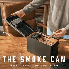 The Smoke Can - Lock, Load, & Savor Introducing 'The Smoke Can,' a cigar humidor with a twist – it's made from a real M2A1 ammo can, giving it a rugged, military-inspired edge. This isn't just a humidor; it's a fortress for your cigars, complete with cleverly hidden humidity controls beneath its Spanish cedar trays and a top-notch digital hygrometer for precise climate management. The cedar not only looks good but also keeps your cigars in ideal condition, while the magnetic accessory holder in Old Tool Boxes, Travel Humidor, Accessory Holder, 50 Cal, Watch Boxes, Pipes And Cigars, Construction Crafts, Cigars And Whiskey, Humidor