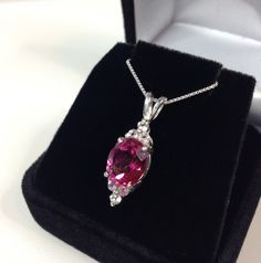 "Gorgeous Pink Topaz & White Topaz Pendant Necklace * 3ct Oval Cut Natural Bright Pink Topaz measures 10mm x 8mm * Brilliant Cut Natural White Topaz Accents measure 2.25mm Round each * 4cts total Gemstone weight * Solid Sterling Silver * 18\" Sterling Silver Chain Included Hallmarked & Gift Ready! Matching Ring & Earrings also available! TIMELESS, BEAUTIFUL & UNIQUE FINE ART JEWELRY!" Formal Oval Necklace With Accent Stones, Round Wedding Necklaces With Accent Stones, Fine Jewelry Wedding Necklaces With Accent Stones, Diamond Necklaces With Accent Stones For Wedding, Wedding Necklace With Diamond Accent Stones, Wedding Diamond Necklaces With Accent Stones, Wedding Diamond Necklace With Accent Stones, Wedding Necklaces With Gemstone Accents, Anniversary Necklaces With Accent Stones