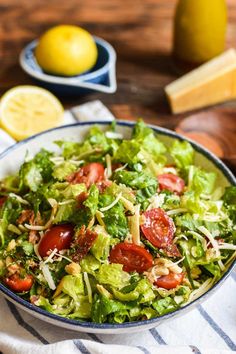 a salad with tomatoes and lettuce in a bowl