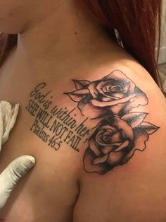 a woman with a rose tattoo on her shoulder and the words, god is within us shall not fail