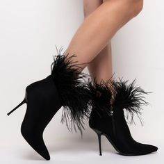 The Azalea Wang Ruffle Your Feathers Stiletto Bootie In Black Is A Statement Ankle Bootie That Features A Feather Ankle Detailing. This Bootie Is Also Complete With A Stiletto Heel, A Pointed Toe, And A Side Zipper Closure. -All Man-Made Materials - Pointed Toe - Stiletto Heel Party Heeled Boots With Ankle Strap For Spring, Elegant Ankle Boot Heels For Party, Elegant Ankle Boots For Party, Glamorous Party Heels With Feather Trim, Chic Heeled Boots With Ankle Strap For Evening, Chic Evening Heeled Boots With Ankle Strap, Elegant Ankle Strap Heels With Feather Trim, Formal Ankle Strap Heels With Feather Trim, Formal Heels With Feather Trim And Ankle Strap