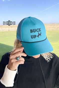 Upgrade your wardrobe with our beautiful teal Buck Up Cap! Featuring an embroidered design, this cap is the perfect addition to your collection. Show off your style and add some positive vibes to your outfit with our Buck Up Cap. One size. Snapback. Swimsuit Jewelry, Horse Hair Pottery, Dresses Western, Western Graphic Tees, Belt Top, Upgrade Your Wardrobe, Essential Dress, Curvy Jeans, Plus Size Shopping