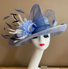 "Three layers of sinamay with beautiful bow and feather flowers, elegant, light and comfortable to wear. Perfect for weddings, Royal Ascot horse races, cocktails, tea party, Mother's Day, Easter, derby... Warm tips:  ❤️If you are looking for a customized piece, please send me a message and let's create something unique just for you!  ❤️Group discount on 3 or more pieces, please contact me for further information on group discount. ❤️Due to the nature of my items, I do not accept return or exchan Blue Feathered Hat For Races, Blue Feather Trim Mini Hat For Kentucky Derby, Blue Mini Hat With Feather Trim For Kentucky Derby, Blue Hat With Feather Trim For Weddings, Blue Hats With Feather Trim For Weddings, Blue Feather Trim Hat For Races, Blue Mini Hat With Feather Trim For Summer, Blue Mini Hats With Feather Trim For Summer, Blue Feather Trim Mini Hat For Summer