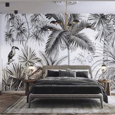 a bedroom with palm trees on the wall and a large bed in front of it