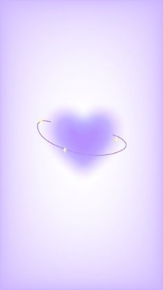 a heart shaped object is shown on a purple background