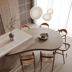 a wooden table with chairs around it in front of a wall mounted vase and lamp