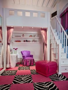 a living room with zebra print rugs and purple chairs in the middle of it