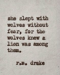 an old typewriter with the words, she slept with werewolvess without fear for the wolf's knew a lion was among them