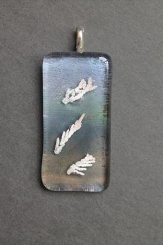 Did you know? These pendants have REAL leaves fused inside them! The white leaves you see, is the ash burnout of a real plant that I placed between 2 pieces of glass. The plant will now live forever in a glass pendant.  * * #glassart #oneofakind #glassjewelry #leafpendants #ashburnout #glassnecklace #glasspendant #fusedglass #glassfusedpendant #functionalart #wearableart #handmadeglass #mixedmediaart #uniquefusedpendant #kilnworkedpendant #etsyjewelry #etsypendant #etsyartist #megnificentstudios