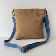 Denim Blue Canvas Crossbody Bag, Denim Blue Canvas Shoulder Bag With Zipper, Denim Blue Canvas Shoulder Bag For Daily Use, Denim Blue Canvas Shoulder Bag For Everyday Use, Denim Blue Cotton Bags For Everyday Use, Canvas Shoulder Bag In Denim Blue For Daily Use, Denim Blue Cotton Bag With Adjustable Strap, Denim Blue Cotton Crossbody Shoulder Bag, Denim Blue Canvas Bag With Adjustable Strap For Travel