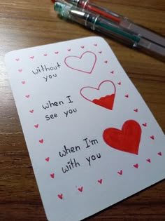 valentine's day card with two hearts drawn on it and the words without you, when i see you, when i'm with you