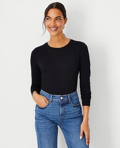 Elevate your wardrobe with the timeless elegance of the Ann Taylor Long Sleeve Crew Neck Top. This essential piece is perfect for any occasion, seamlessly blending comfort and style.

- Size: 2XS
- Color: Black
- Material: 100% Cotton
- Gender: Female
- Length: 24 1/2 inches
- Fit: Soft and stretchy
- Care Instructions: Machine washable

Crafted from soft, 100% cotton, this top features a classic crew neck and long sleeves, ensuring a flattering fit that hits at the hip. Whether dressed up for t Crew Neck Outfit, High Neck Long Sleeve Top, Petite Casual, Raglan Sleeve Sweater, Knitted Suit, Hip Style, Black Long Sleeve Shirt, Petite Tops, Light Sweater