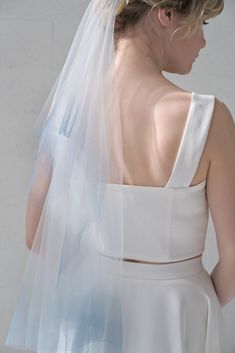 "A double tier handkerchief veil with custom hand dyed ombre tips. The longer length you choose - the proportion between tiers will remain the same. A very edgy, whimsical, fun looking veil for your special day - it cascades in beautiful handkerchief edges all of which are hand dyed with the color of your choice. You can request it to be any sort of custom color, either ombre or just one color, but please be aware - very deep, bold dip dyes, such as red, navy, black are not achievable by my tech Blue Organza Tulle Fabric For Wedding, Blue Tulle Fabric For Wedding, Ombre Veil, Unique Veil, Blue Veil, Something Blue Bridal, Two Piece Wedding Dress, Ombre Wedding, Bridal Skirts