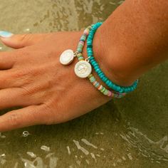 Get ready to ride the waves with our super fun Crystal Coast Beaded Bracelet! This vibrant piece is packed with aqua heishi shell beads that scream beach vibes and endless summer fun. The bright aqua beads remind you of clear blue waters and sunny skies, making it the perfect accessory to jazz up any look. - Wax coated nylon string, adjustable closure - Bracelet length adjustable from 2"-5" - 4mm aqua rondelle heishi beads - Features a small Silver / White St. Christopher Pastel Sunset, Clear Blue Water, Aqua Beads, Outfit Making, Sunset Sky, Heishi Beads, Beach Vibes, Shell Beads, Endless Summer