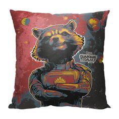 a pillow with a rocket raccoon on it's back and the words, guardians