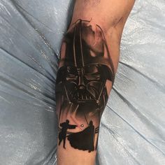 a man with a darth vader tattoo on his arm