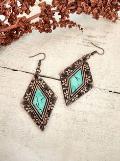 Handmade from solid cowhide leather, these earrings are hand-tooled to resemble Turquoise stone! Slowly handmade without a pattern, these are unique and one of a kind designs. The leather is cut, tooled, dyed, painted, distressed and antiqued all by hand in a process that produces one of a kind jewelry! You will get the exact earrings in the photo. Ready to ship, with fast and free shipping. Handmade with lots of love in my mountain studio! Please see my other offerings at theLeatherKnot.etsy.co Hand Tooled Leather Earrings, Cowboy Candy, Custom Leather Work, Leather Jewelry Making, Diy Leather Earrings, Leather Jewelry Diy, Leather Earring, Leather Ideas, Turquoise Leather