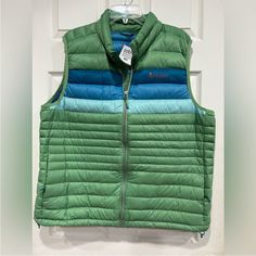 New With Tags Color: Kelp Stripes Similar To Patagonia Down Sweater Vest Blending Water-Resistant 800-Fill-Power Goose Down With A Streamlined Design, The Women's Cotopaxi Fuego Down Vest Is The Perfect Outer Layer And Mid Layer All In One. Features 20-Denier Giant Ripstop Nylon With Durable Water Repellent (Dwr) Treatment Helps Moisture Bead Up On The Surface 20-Denier Mini Ripstop Nylon Lining Elastic Binding At Armholes And Hem Seal Out Cold Zippered Hand Pockets; 2 Interior Stash Pockets; Ja Insulated Jacket Women, Patagonia Down Sweater, Lightweight Vest, Polartec Fleece, Womens Puffer Vest, Reversible Vest, Hooded Vest, Womens Parka, Fleece Vest