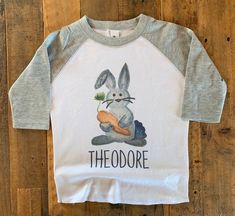 Easter shirt for girls and boys! Easter basket tags found here: https://www.etsy.com/TheosLane/listing/966186797/easter-tags-sibling-easter-tags-easter?utm_source=Copy&utm_medium=ListingManager&utm_campaign=Share&utm_term=so.lmsm&share_time=1613765265052 I can change colors just leave a note at checkout! All onesies are gerber brand onesies. **Please note all items are HANDMADE, therefore there may be a slight difference in positioning of the design than the ones pictured. We do Boys Easter Shirt, 2023 Rabbit, Coming Home Outfit Boy, Toddler Easter Shirt, Baby Boy Easter, Easter Shirts For Boys, Make Your Own Shirt, Easter Basket Tags, Easter Bunny Shirts