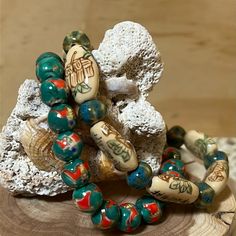 Nwot ~ Artisan Ceramic Beaded Bracelets ~ Stretch 2 ~ Artisan Bohemian Ceramic Bracelets Green/Beige/Red/Blue Approximately: 6”~ 6.5” Each Stretch Cording New And Never Worn Vintage And Preowned Items Often Have Wear And Tear From Normal Use, Improper Storage Or Care. All Items Are Presented To The Best Of My Ability And Knowledge. Please Feel Free To Reach Out With Questions Or Clarification You Might Have On An Item Prior To Purchasing. Please Manage Your Expectations When Bidding Or Purchasing, All Sales Are Binding Per Poshmark Policies. All Items Are "As Is" And Not Returnable. Thanks For Stopping By, Enjoy! Spiritual Festival Bracelets With 108 Beads, Spiritual Festival Bracelet With 108 Beads, Symbolic Multicolor Beaded Bracelets As Gift, Artisan Handmade Bracelets For Meditation, Handmade Bohemian Bracelets For Meditation, Bohemian Beaded Bracelets With Round Beads As Gifts, Bohemian Handmade Bracelets For Meditation, Traditional Wooden Beads Bracelets For Festival, Symbolic Multicolor Beaded Bracelets With Round Beads