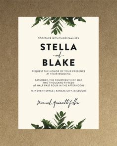 an image of a wedding card with greenery on the front and bottom, in black ink