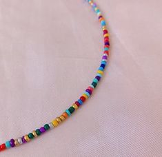 Trendy Multicolor Beaded Necklace For Vacation, Trendy Rainbow Beaded Necklace For Festivals, Playful Multicolor Beaded Necklaces For The Beach, Fun Summer Festival Beaded Necklaces, Fun Multicolor Adjustable Beaded Necklaces, Fun Multicolor Beaded Necklaces For Beach, Fun Adjustable Multicolor Beaded Necklaces, Colorful Adjustable Fun Beaded Necklaces, Fun Multicolor Beaded Necklaces