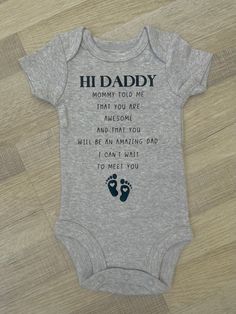 Adorable onesie custom-made to introduce your little one to their Daddy. This is perfect for a welcoming announcement or gift Care Instructions: - Turn the fabric inside out - Wash in cold water - Air dry  PLEASE NOTE : Colors may vary slightly from what is displayed on your monitor and displayed settings. Proofs and sample images are graphic representations, not actual photos of printed items. If you have any questions or custom order requests, send me a message! I would love to bring your vision to life! Daddy To Be Gift Ideas, Pregnancy Announcement For Husband, Pregnant Announcement, Baby Surprise, Significant Other, Gender Neutral Baby, Pregnancy Announcement, Baby Bodysuit