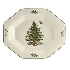 a green and white plate with a christmas tree on it