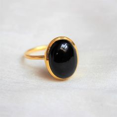 Black Onyx Ring, Sterling Silver Ring, Gold Plated Ring, Oval Black Onyx Ring, Stacking Ring, Proposal Ring, Engagement Ring, Dainty Ring - Etsy Oval Black Enamel Rings For Anniversary, Classic Black Oval Cabochon Ring, Elegant Black Oval Dome Ring, Oval Onyx Cabochon Ring, Oval Cabochon Onyx Ring, Oval Onyx Ring With Cabochon, Oval Onyx Rings For Anniversary, Minimalist Onyx Oval Ring, Onyx Oval Cabochon Rings For Gift