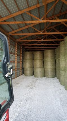 the inside of a truck with hay in it