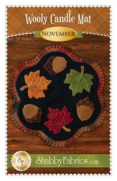 the wooly candle mat is shown with leaves and acorns on it's surface