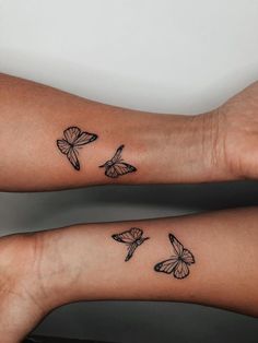 two tattoos with butterflies on their arms