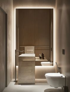 a bathroom with two sinks and a bathtub