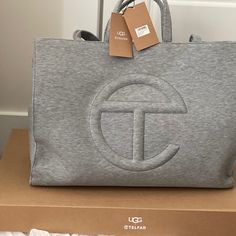 Ugg X Telfar Fleece Large Bag. Received The Matching Boots And Bag However Boots Are Too Big. Since The Boots Are Being Sold (Separate Post) The Bag Is Also Being Sold. Ugg Grey, Telfar Bags, Ugg Bag, Telfar Bag, Luxury Bags Collection, Grey Bag, Girly Bags, Pretty Bags, Cute Purses