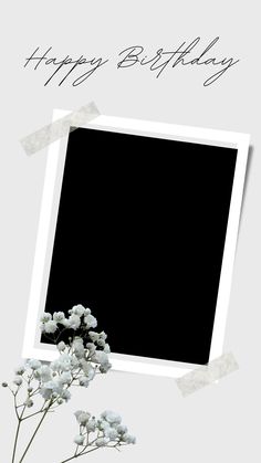 a birthday card with white flowers and a black square in the middle that says happy birthday